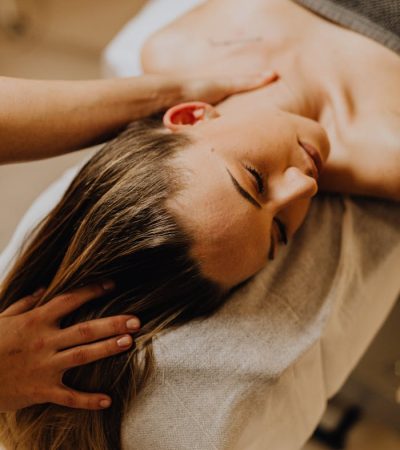hands-of-a-person-massaging-a-woman-lying-on-massage-table-6629547 Hands of a Person Massaging a Woman Lying on Massage Table
